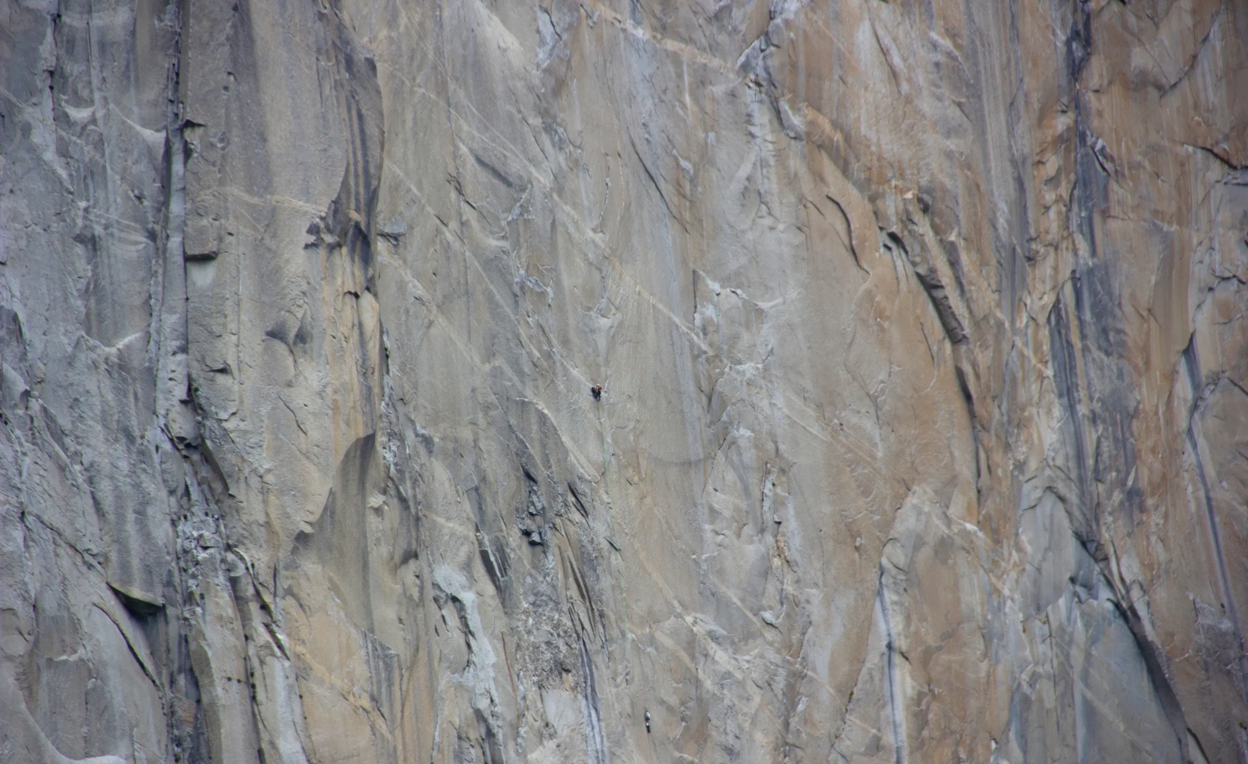 A climber in a sea of granite on El Cap.
